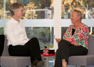 Joanne McRae talking with client, Mayten Consulting